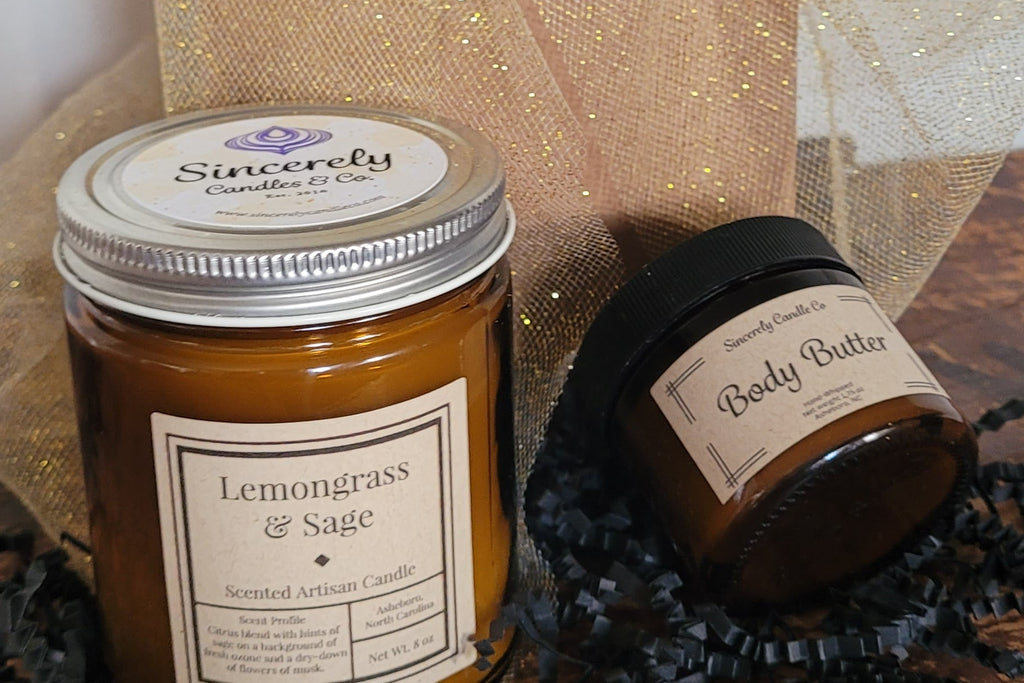 Two jars of 'Sincerely Candles & Co' products, a candle and body butter, with decorative ribbons.